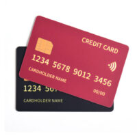 Two credit cards isolated on white background. Red and Black cre